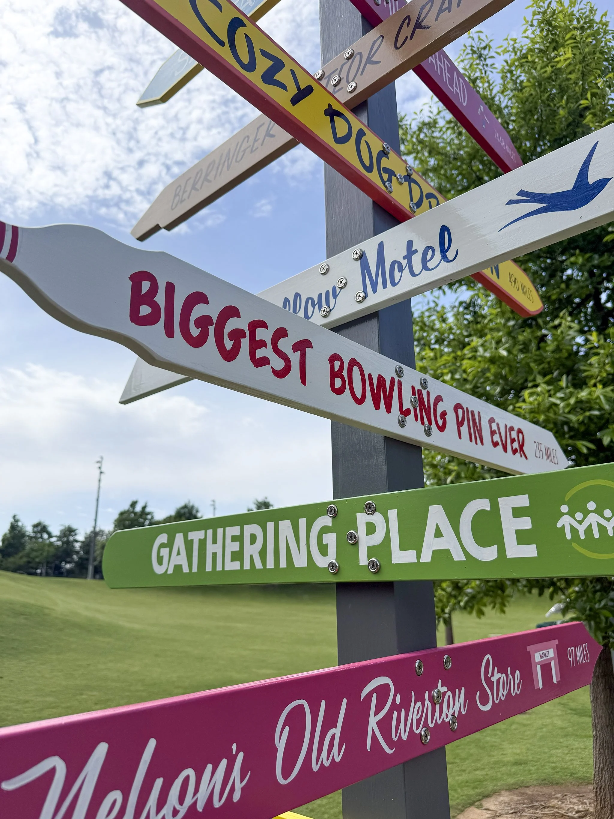 Route 66 directional signs for the 100 Year Anniversary of Route 66 at Gathering Place in Tulsa, OK. 