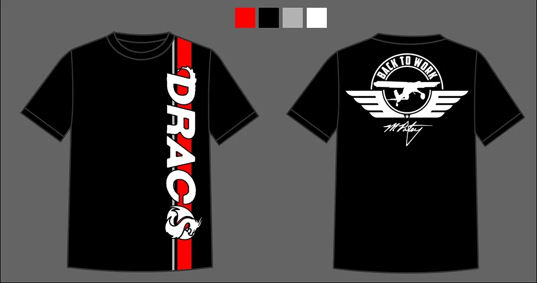 Black T-shirt with Fierce Dragon design, red, black, white, and gray color palette. The front features the word 'DRAGON' vertically with a dragon emblem at the bottom; the backhas a circular emblem with an airplane, wings, and the phrase 'Back to Work' above, and a signature below.