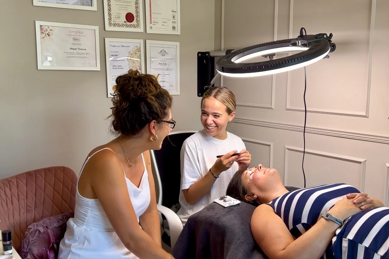 “Onsite lash and brow workshop being delivered within a professional salon and beauty training environment”