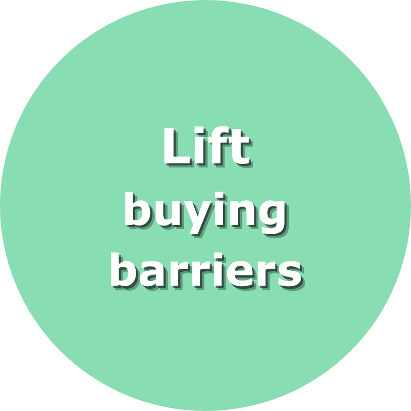 A mint green circular sign with white bold text that reads 'Lift buying barriers'.