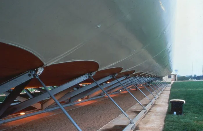 Side-rear view of the the Visitor Centre tube from ground level showing the hull-wraps and support stands.