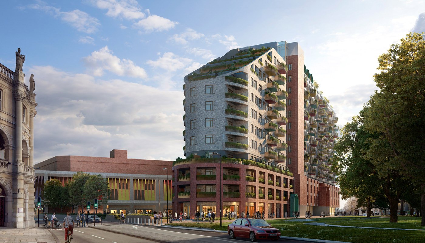 A modern multi-story residential building with curved balconies and a rooftop garden is situated in an urban area. People are walking and cycling on the street, and a red car is parked in front. There are trees and a classical building to the side.