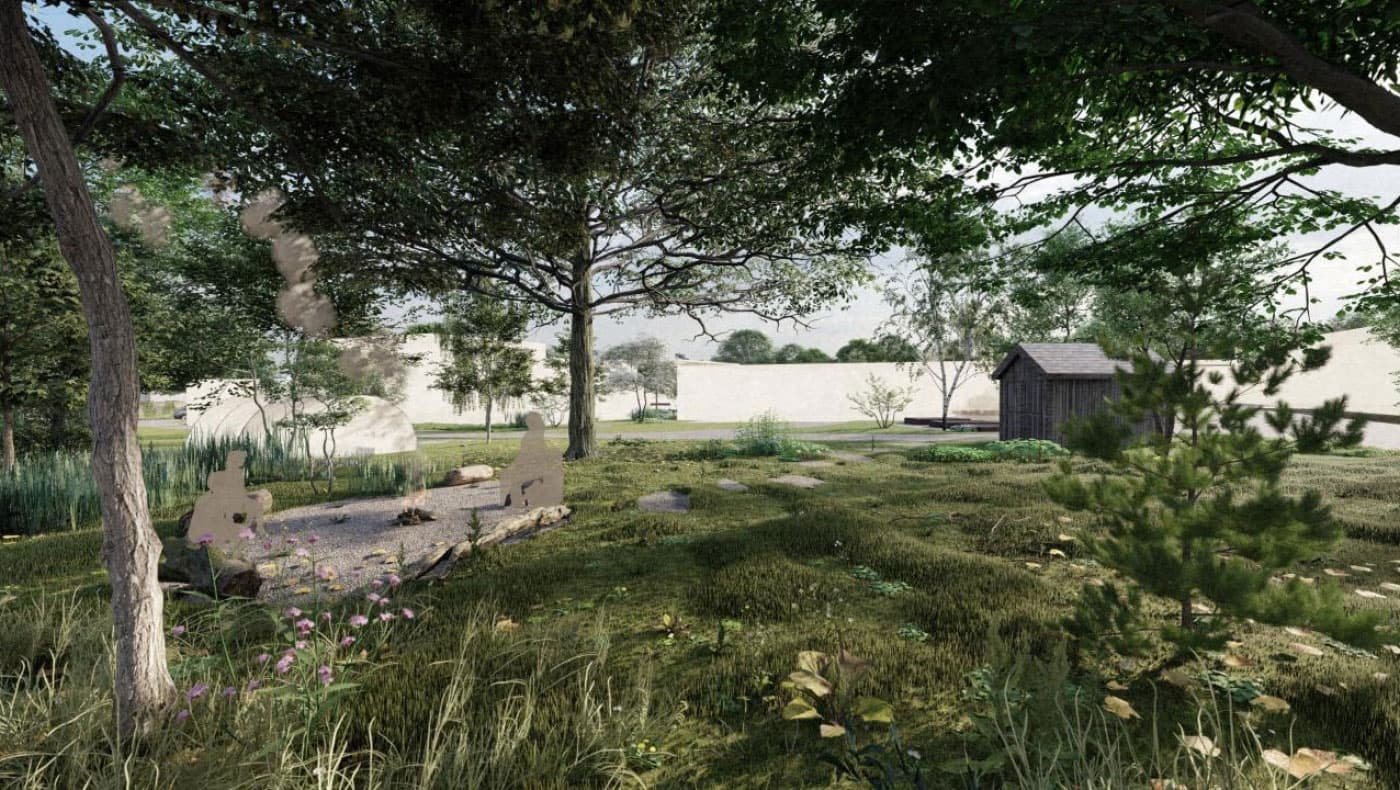 A landscape with trees, grass, rocks, a small pond, wooden sculptures, a wooden shed, and a white wall in the background.