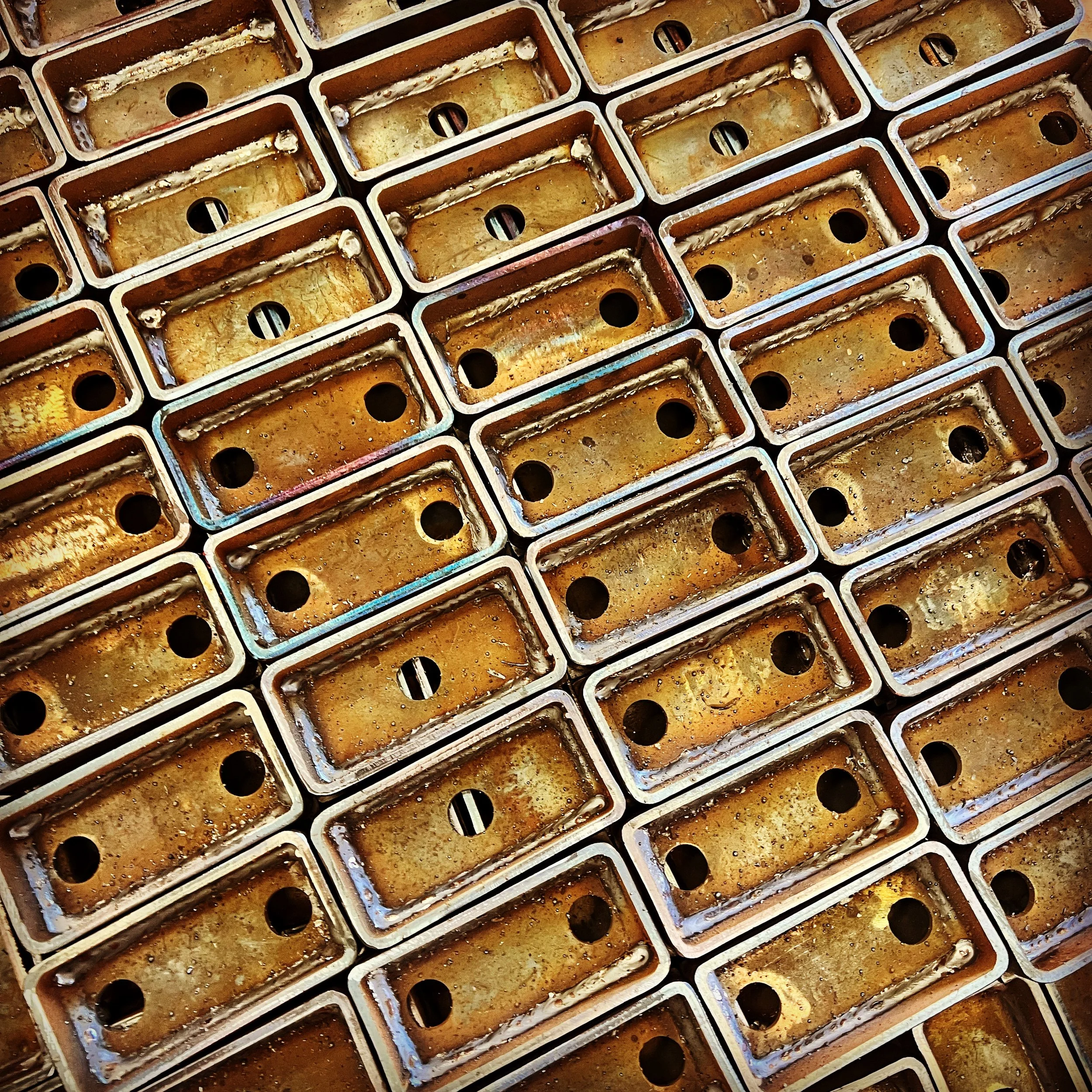 batched mild steel fabricated components.