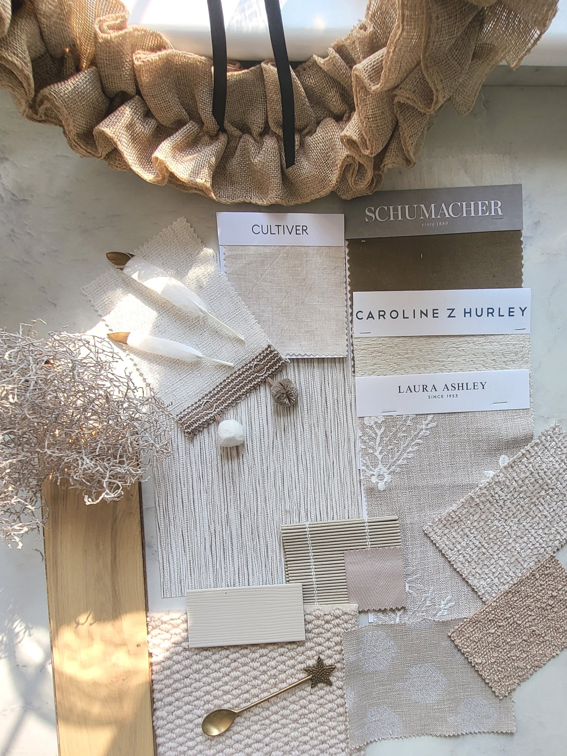 Taupes, Neutrals and soft whites colour palette with wallpaper, paint, fabric swatches and samples, carpet and wooden flooring samples0amples. Carpet & flooring samples.