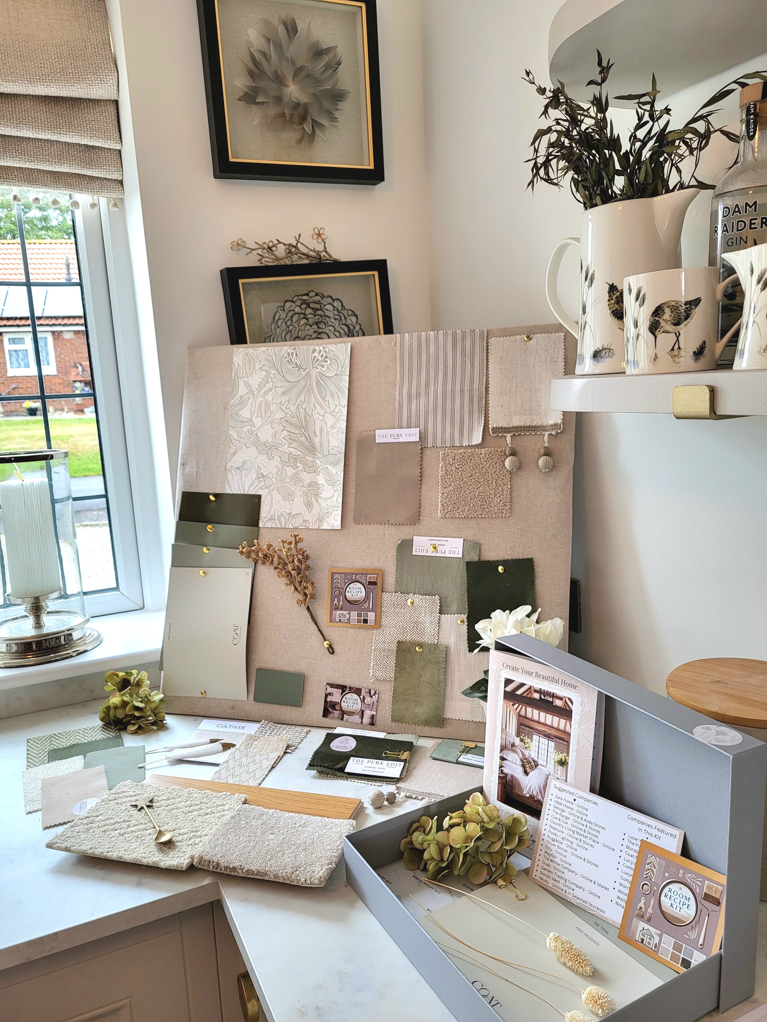 Green & Neutral colour palette with wallpaper, paint, fabric swatches and samples. Carpet & flooring samples.