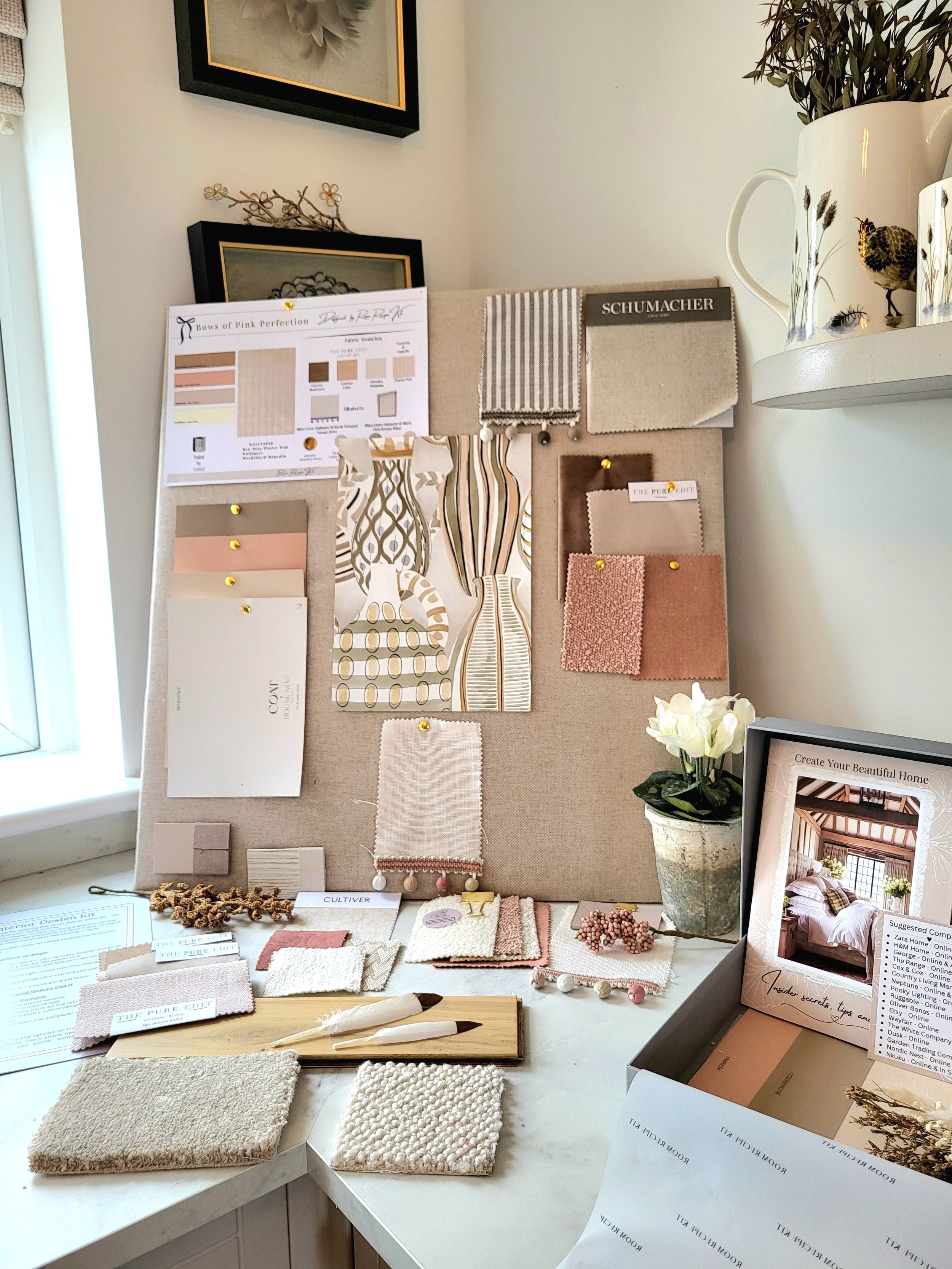 Taupes, Pinky Peach, soft Golds and warm off whites colour palette with wallpaper, paint, fabric swatches and samples. Carpet & flooring samples.
