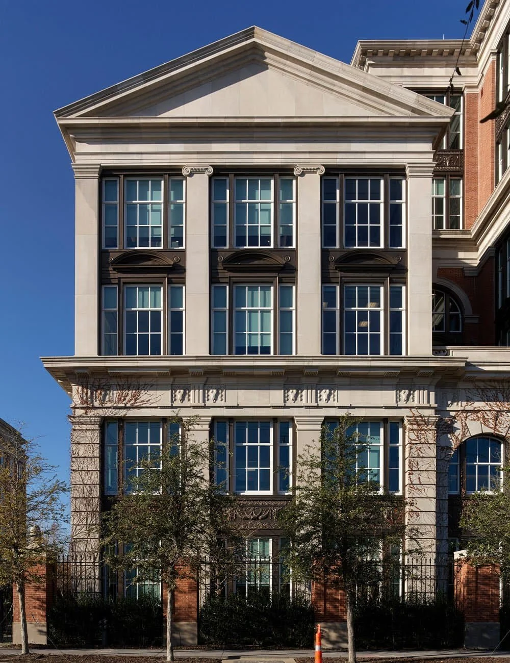 Classical temple wing façade at Freedom Place, Old Parkland, Dallas, designed by Craig Hamilton Architects.
