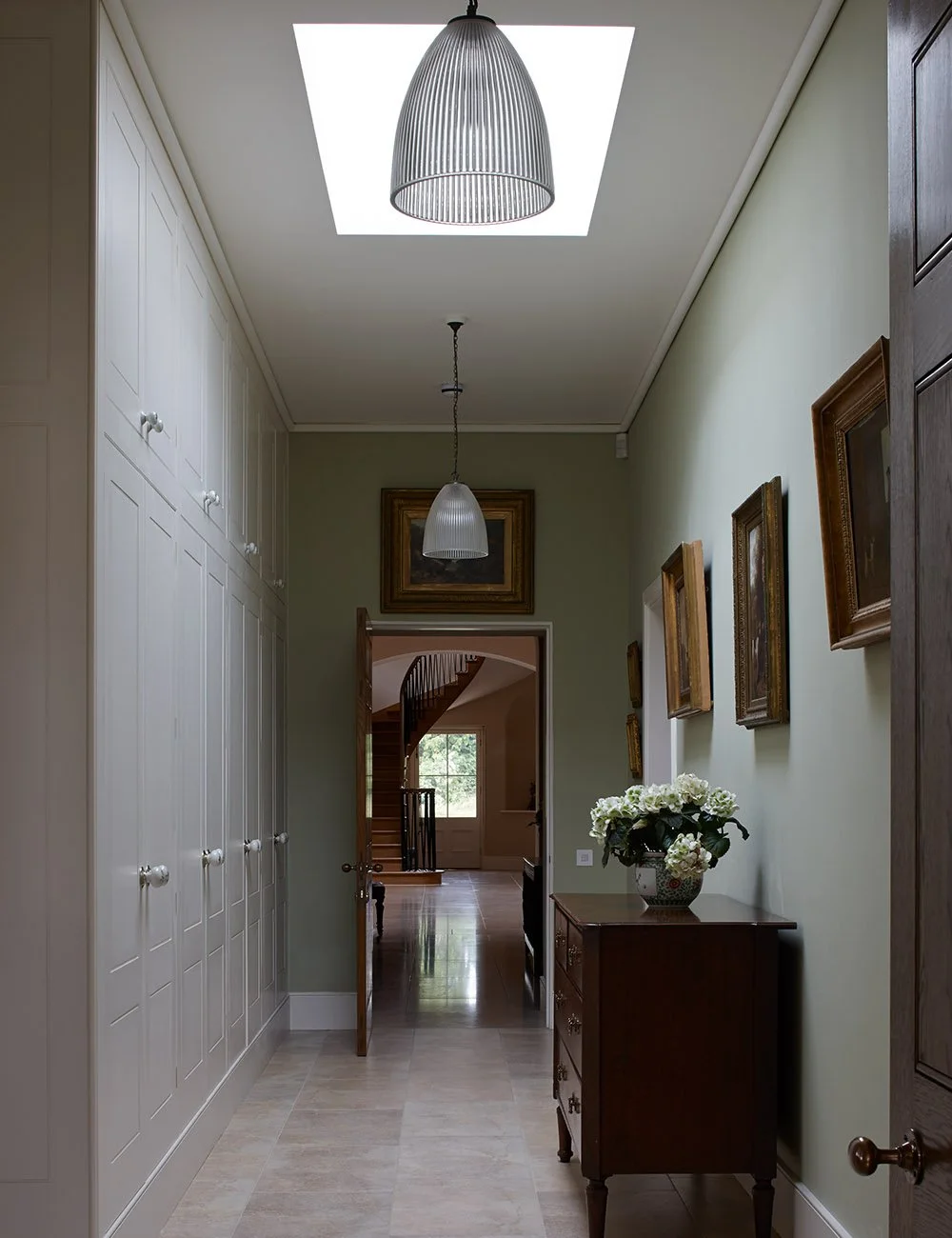 Classical interior corridor with roof lantern, stone flooring and traditional architectural detailing by Craig Hamilton Architects