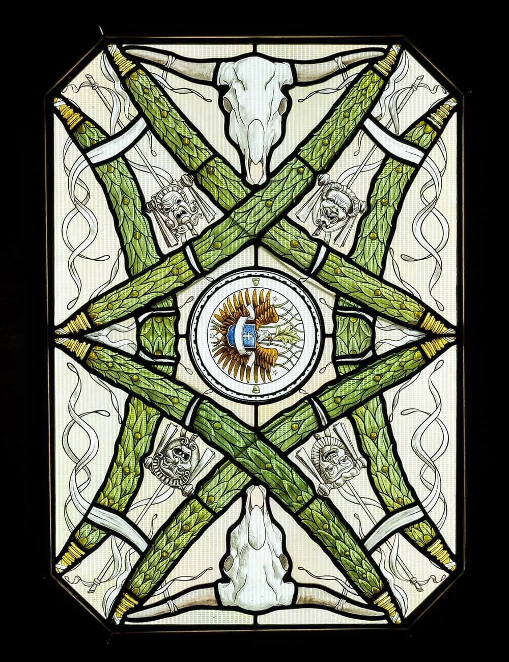 Decorative stained-glass ceiling panel at Freedom Place, Old Parkland, Dallas, featuring classical motifs.