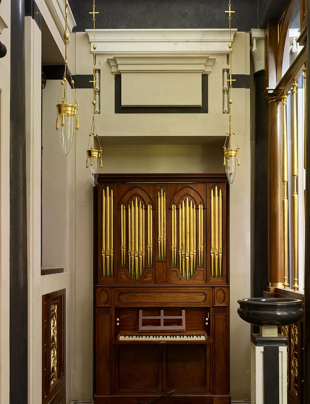 Traditional pipe organ set within the classical interior of the Chapel of Our Lady at Williamstrip.