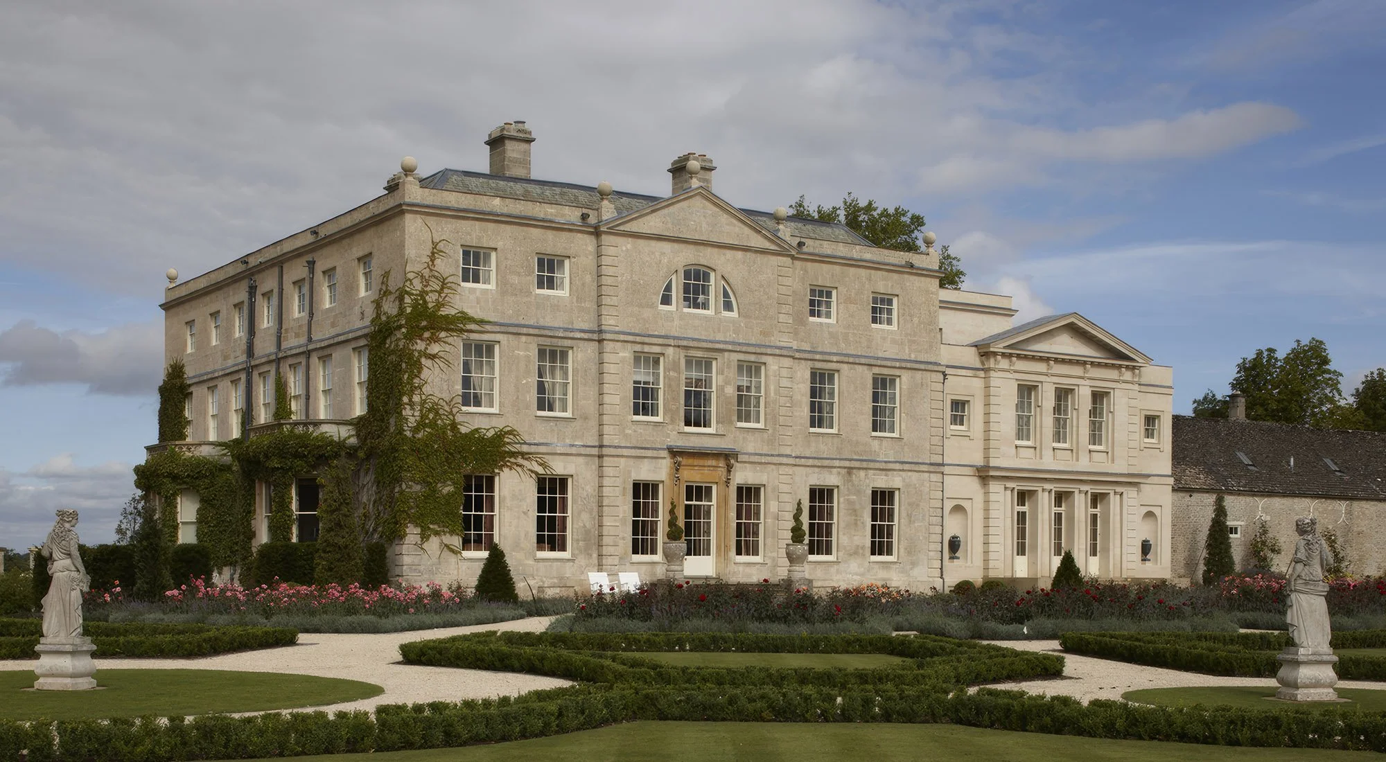 Historic country house with formal gardens in Gloucestershire by Craig Hamilton Architects