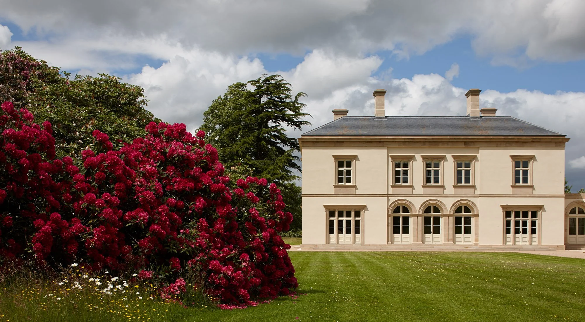 Classical English country house set within landscaped gardens designed by Craig Hamilton Architects.