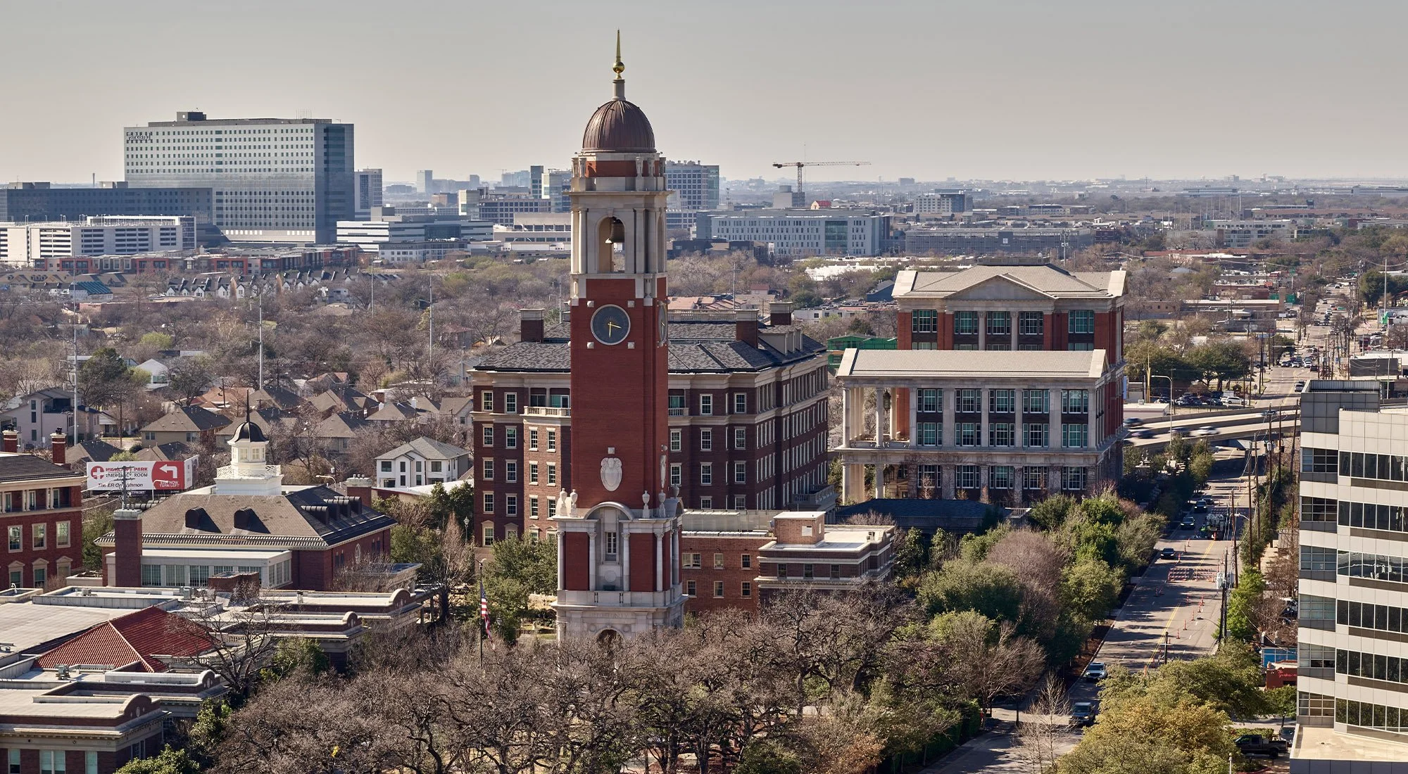 The Campanile in Dallas, Texas, featuring its landmark clock tower and classical architecture within the surrounding urban skyline.