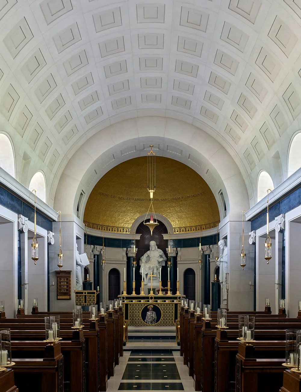 Main nave interior of The Chapel of Christ the Redeemer at Culham featuring coffered ceilings and classical sacred architecture.