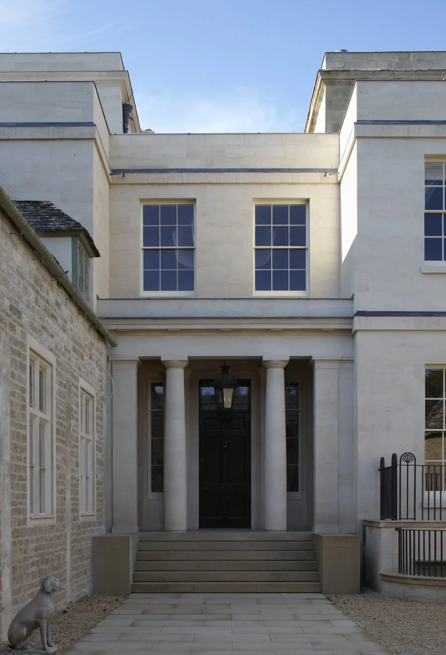 Classical entrance courtyard and stone façades at Gloucestershire country house by Craig Hamilton Architects
