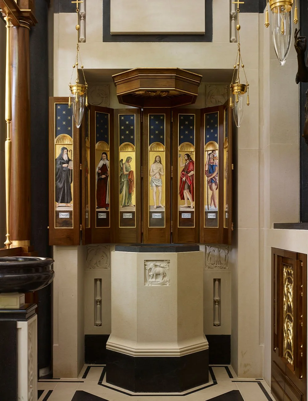 Decorative pulpit featuring painted saints and gilded detailing within the Chapel of Our Lady at Williamstrip.