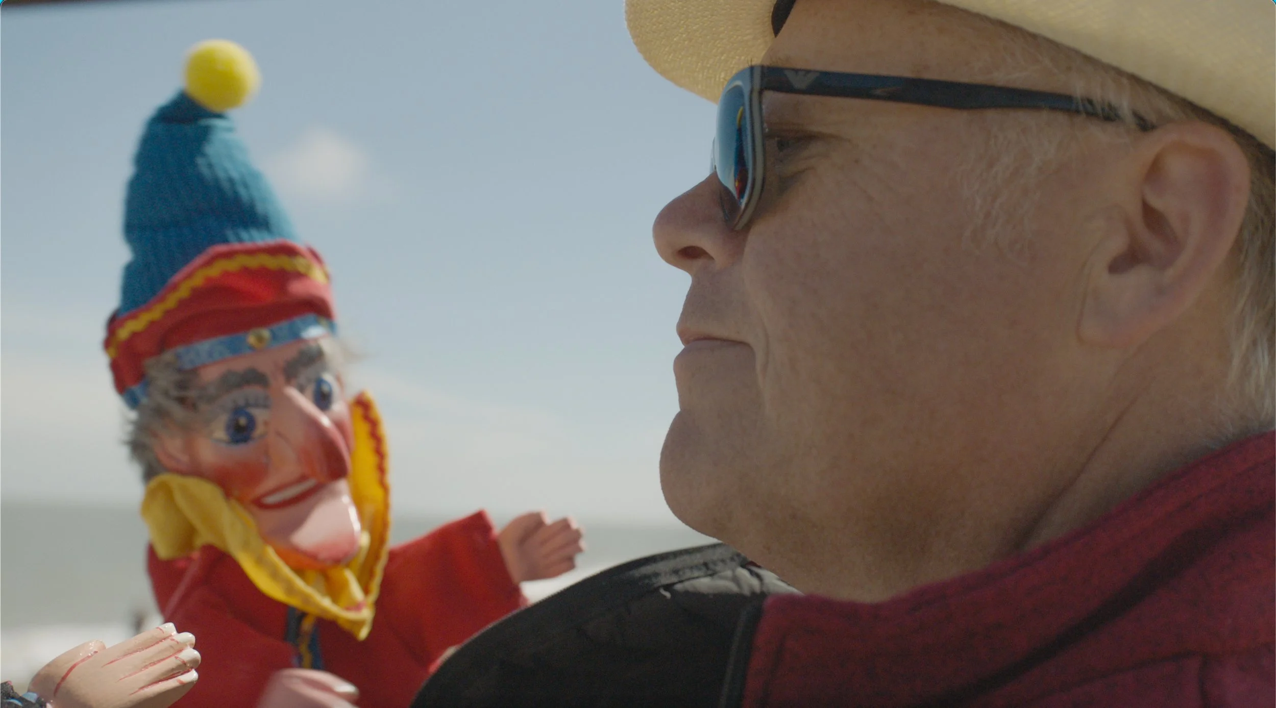 Wayne beach with puppets still.jpg
