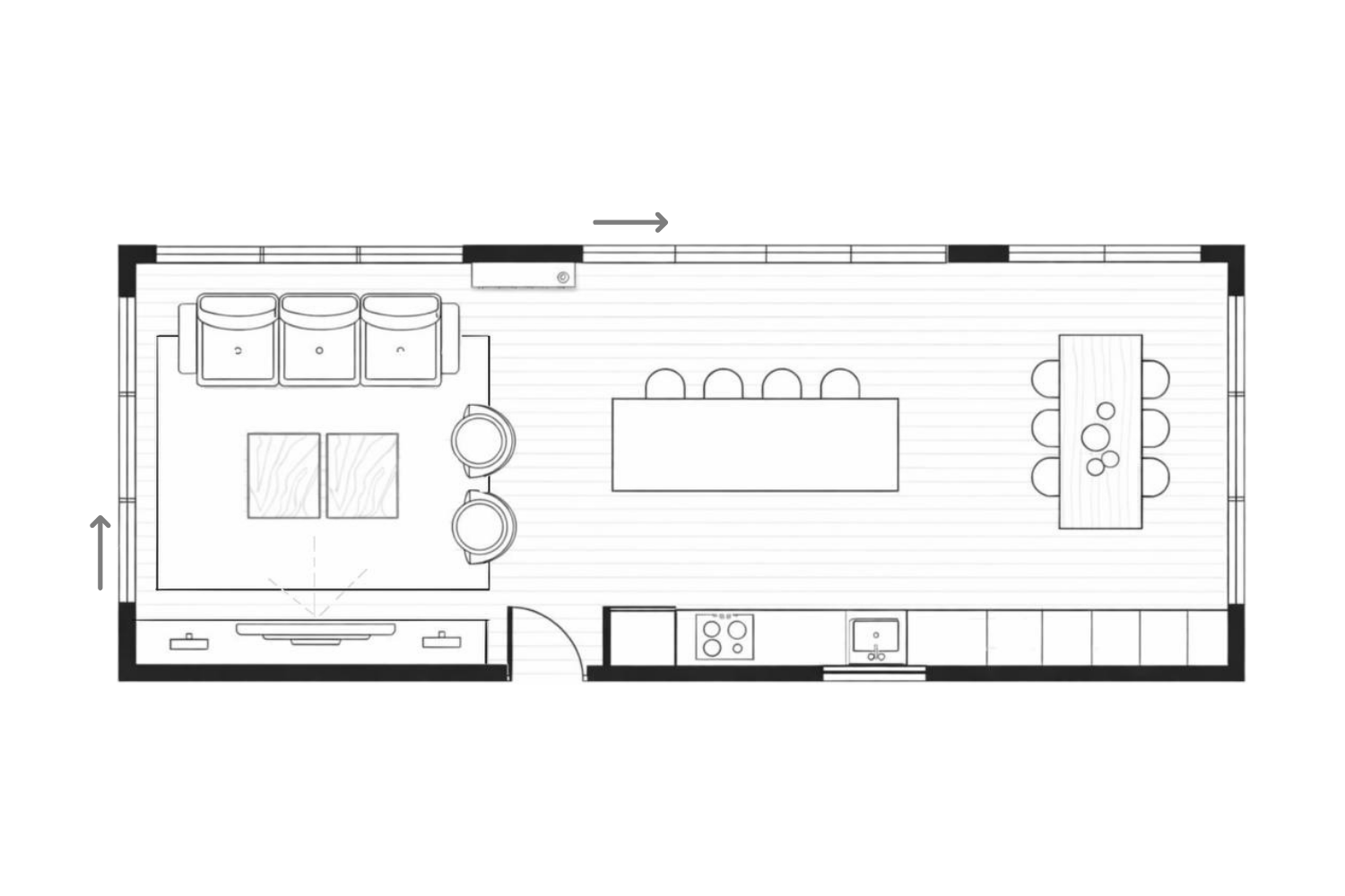 Open-plan kitchen dining living floor plan showing furniture layout with sofa area, kitchen island and dining table.