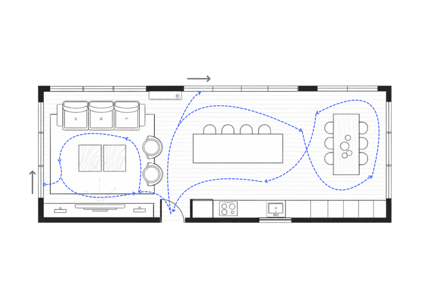 Open-plan floor plan showing circulation routes between kitchen, dining and living zones.