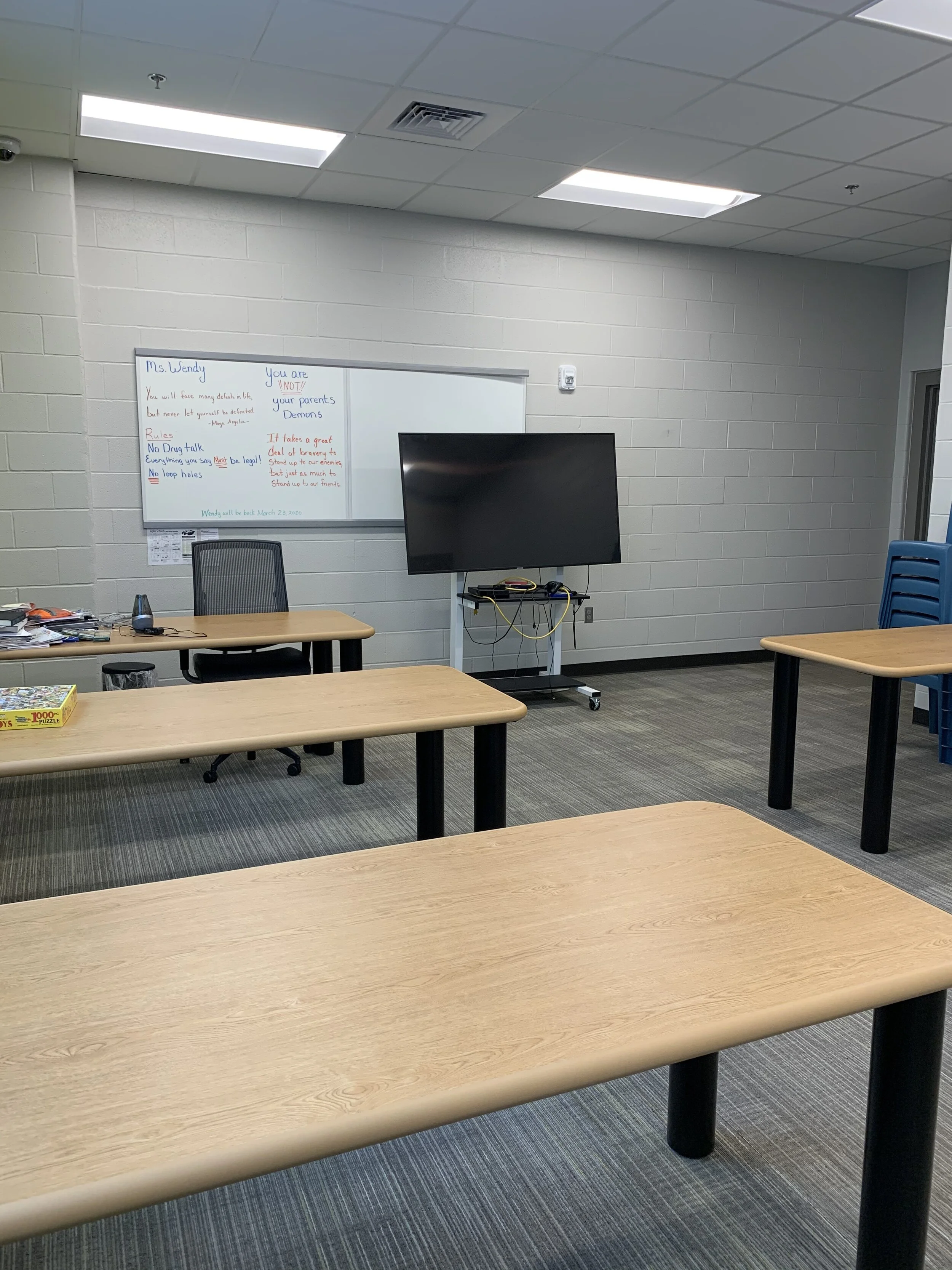 Classroom inside the Jasper County Juvenile Detention Center with desks, chairs, and instructional equipment