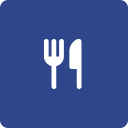 Icon of a fork and knife, representing dining or food.