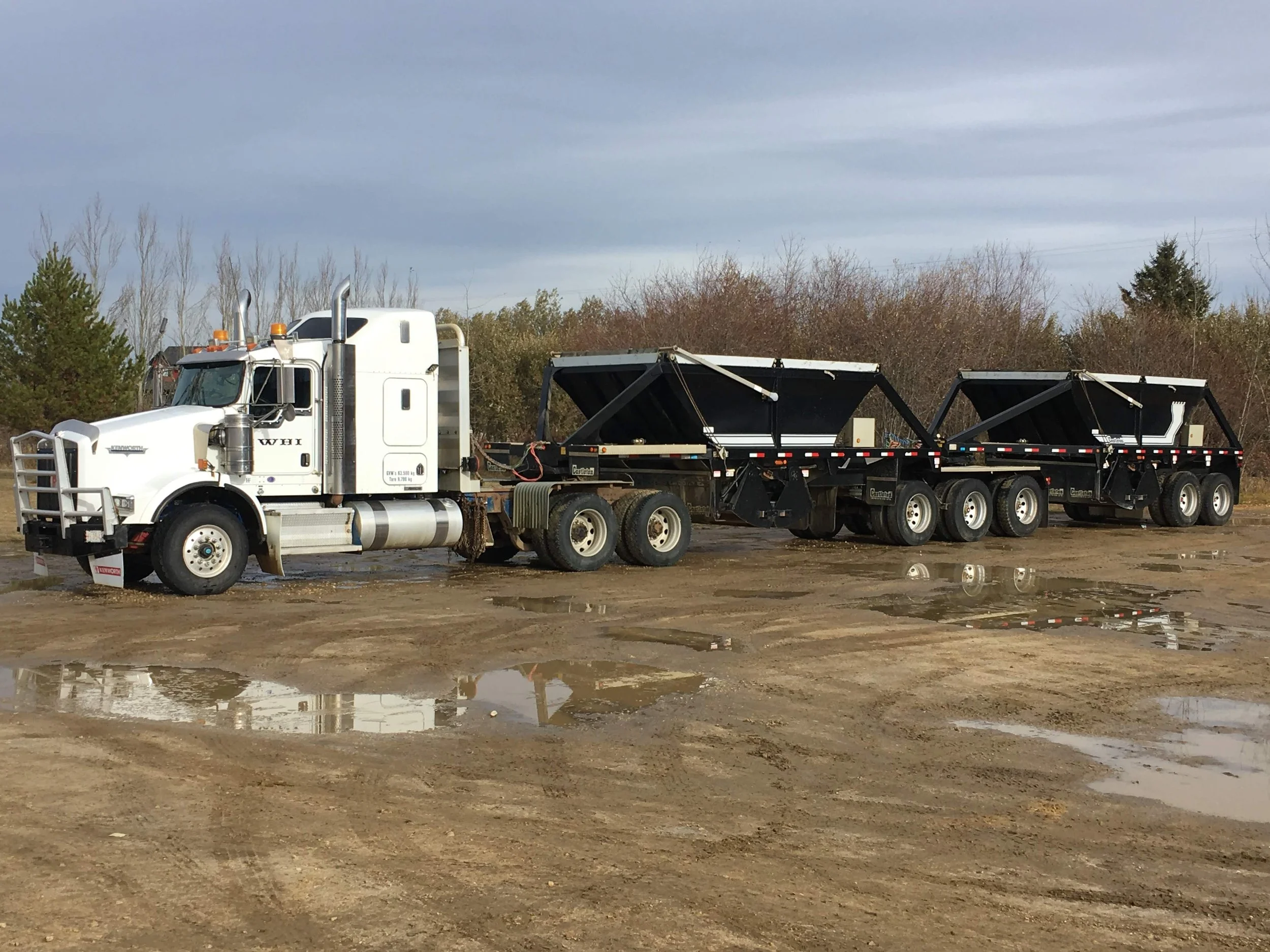 Side Dump End Dump Combination Truck used for efficient hauling by Willowhill Holdings Inc
