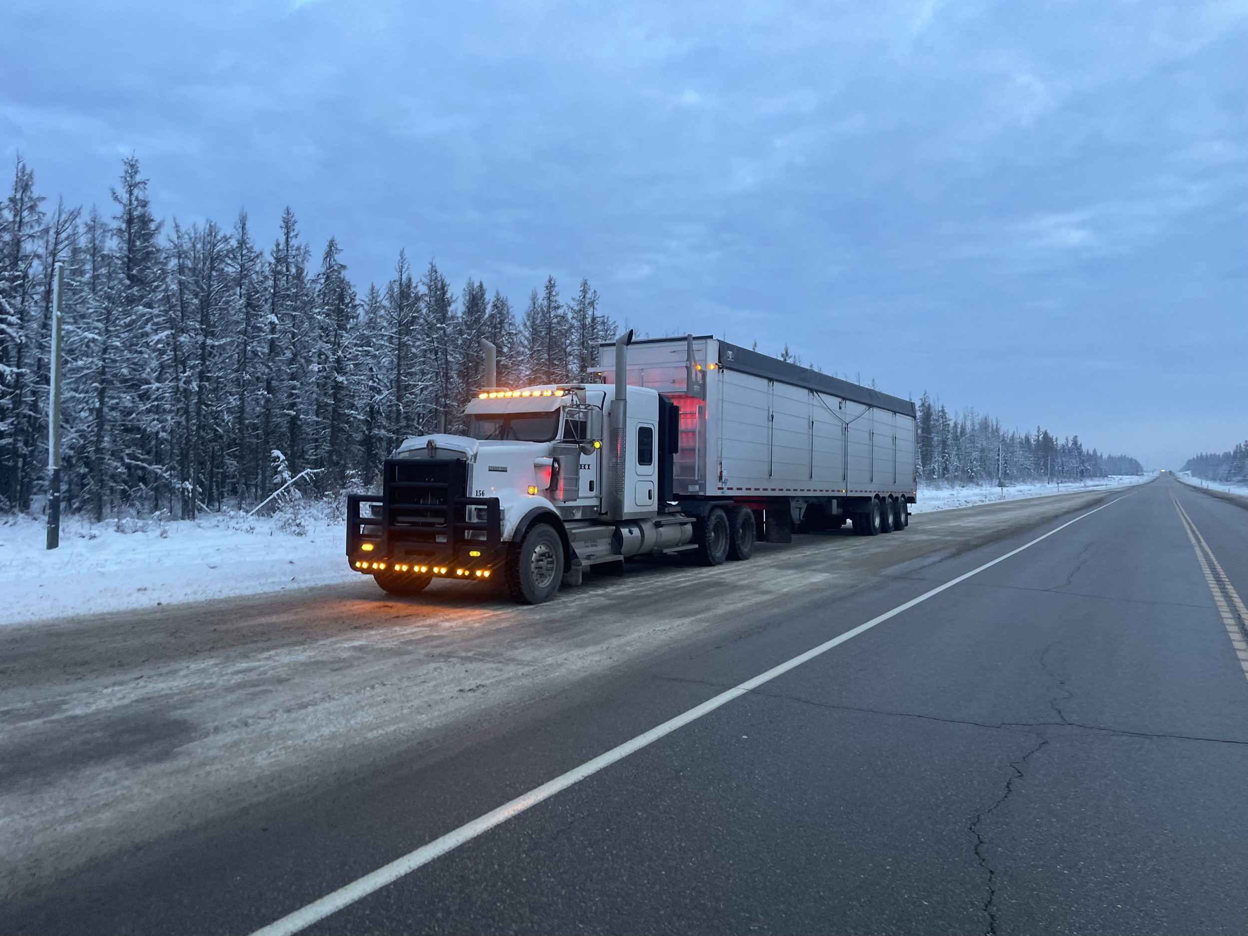 Close-up of Super B Clams and Tridem Clams trucks ensuring secure load transport