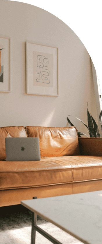 couch with a laptop on it