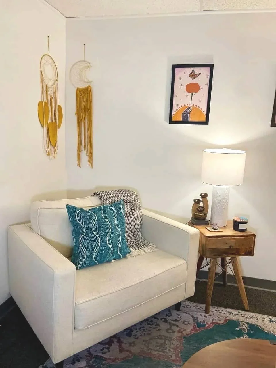Warm and inviting therapy office with couch for adult therapy sessions in Brea.