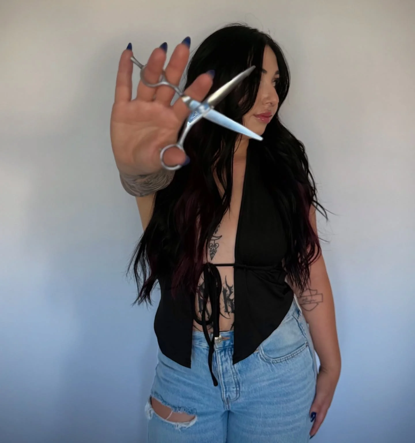 Time to put a face to the name!
Hi y&rsquo;all! My name is Sam &mdash; most of you know me as Sam Sharky &mdash; and I&rsquo;m the owner of Riot Hair Company.

I&rsquo;m a hairstylist who loves all things hair, from blonding to perms, so I offer a wi