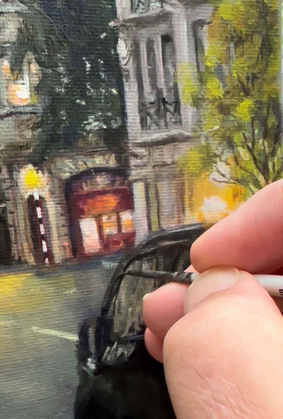 Bassam Andari painting a cityscape scene.jpg