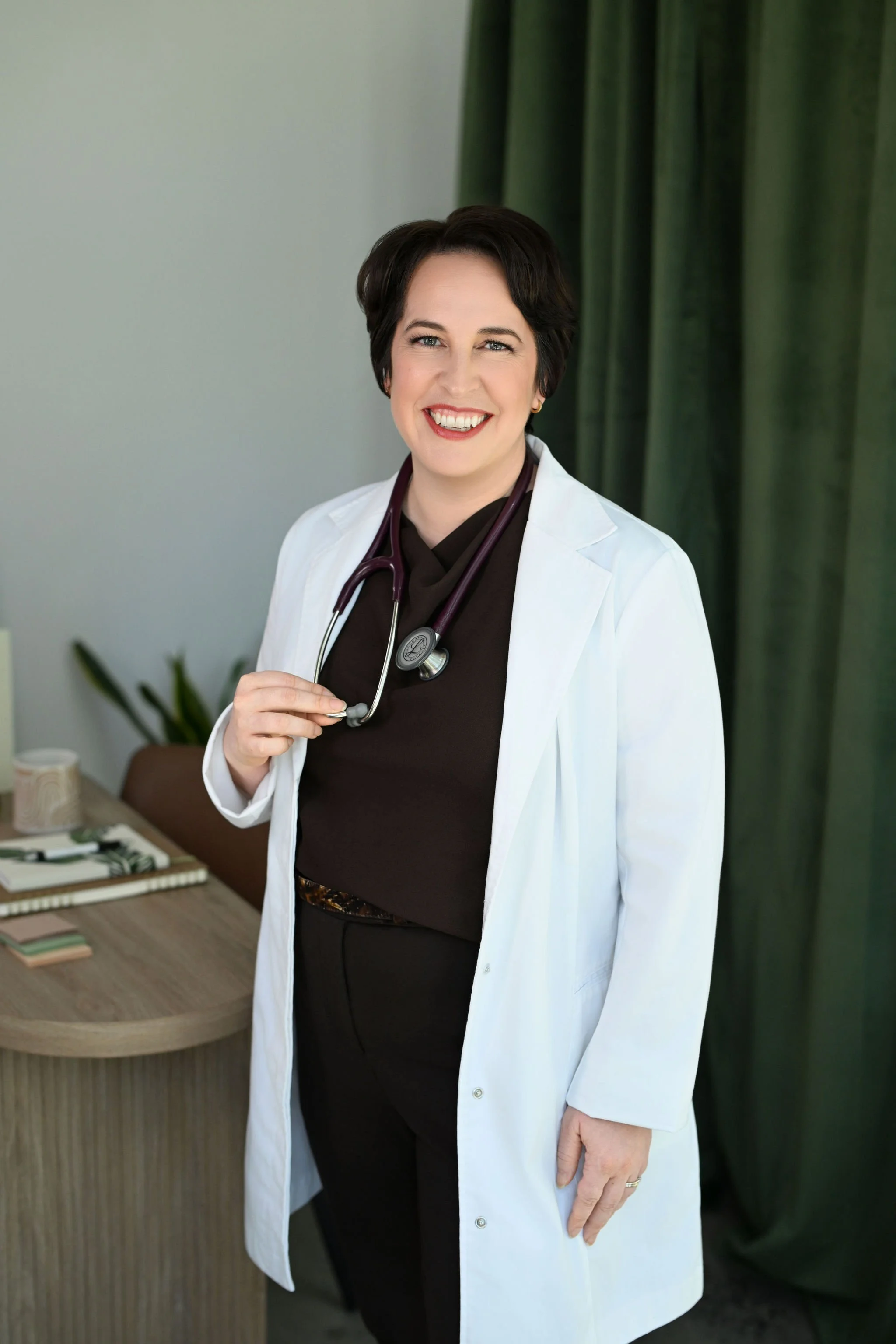 Evelyne Morel, Nurse Practitioner and founder of Quest 4 Health, providing a virtual health consultation.