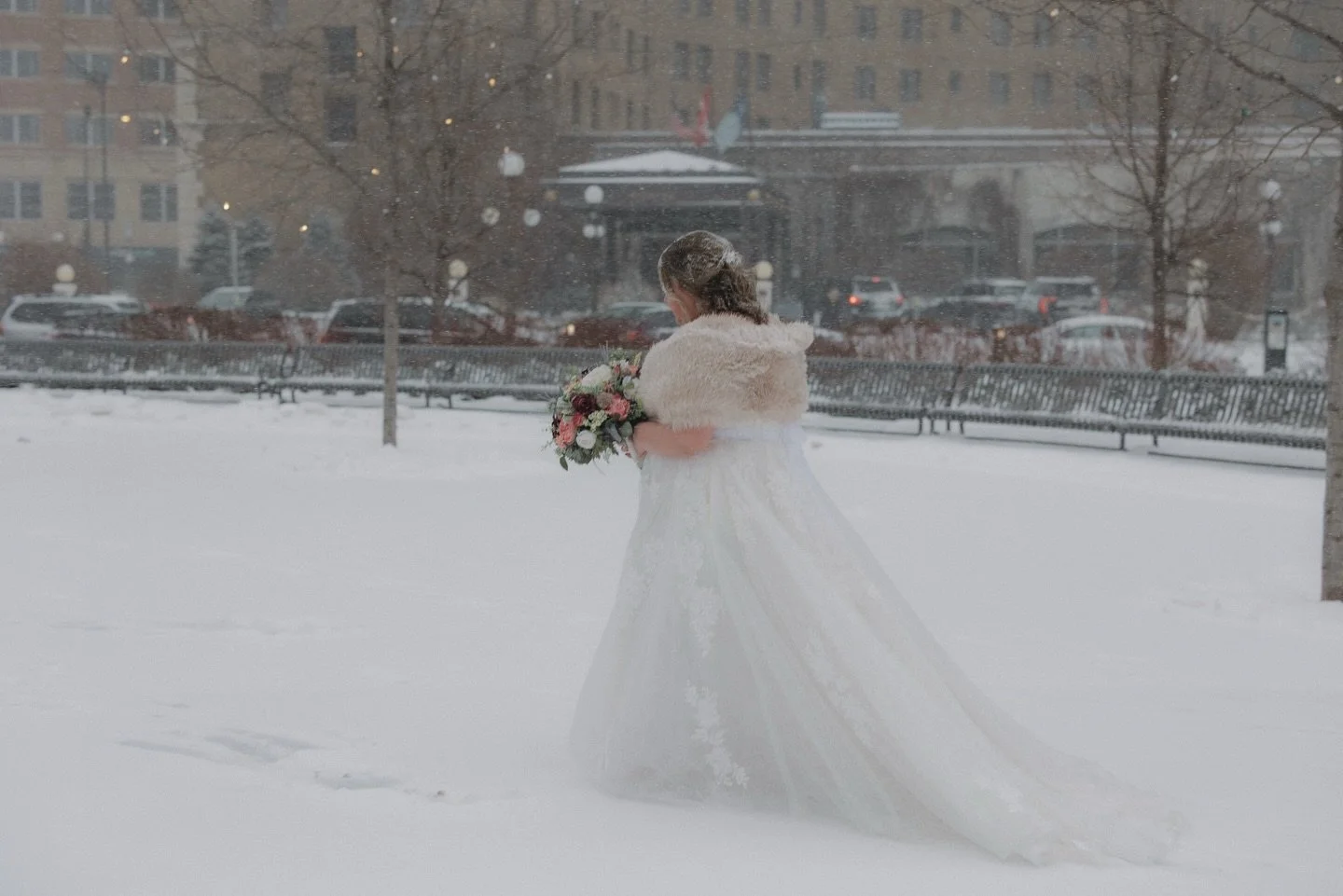 This weather brings me back to a beautiful winter wonderland in St. Paul. 

All your favorite people snowed in together in one place. 

Venue: @landmarkcenterweddings 
photography: @vandystudiosphoto