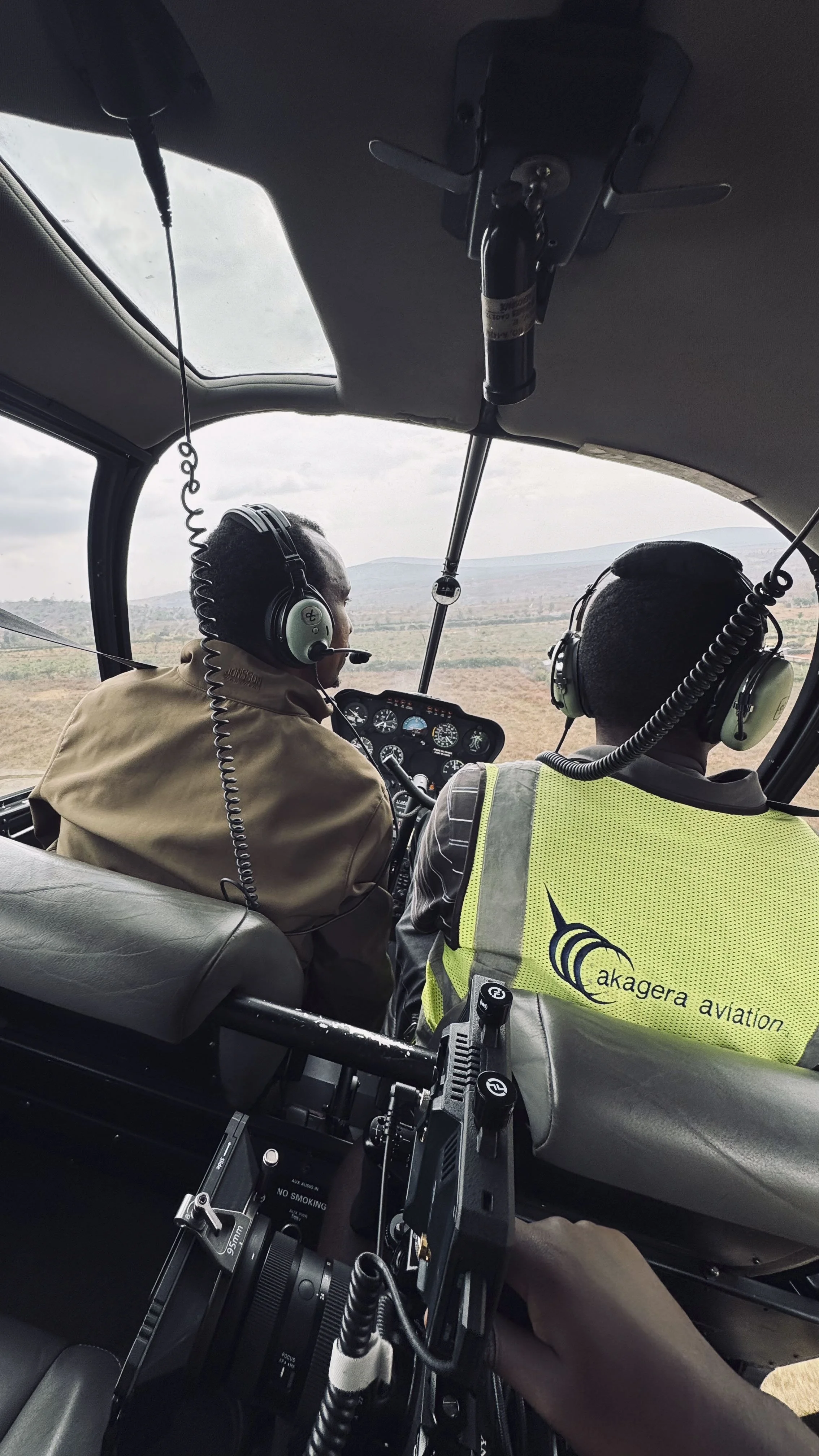 Aerial coverage in the helicopter, filming wildlife in the Akagera National Park. Crane Census Activity.