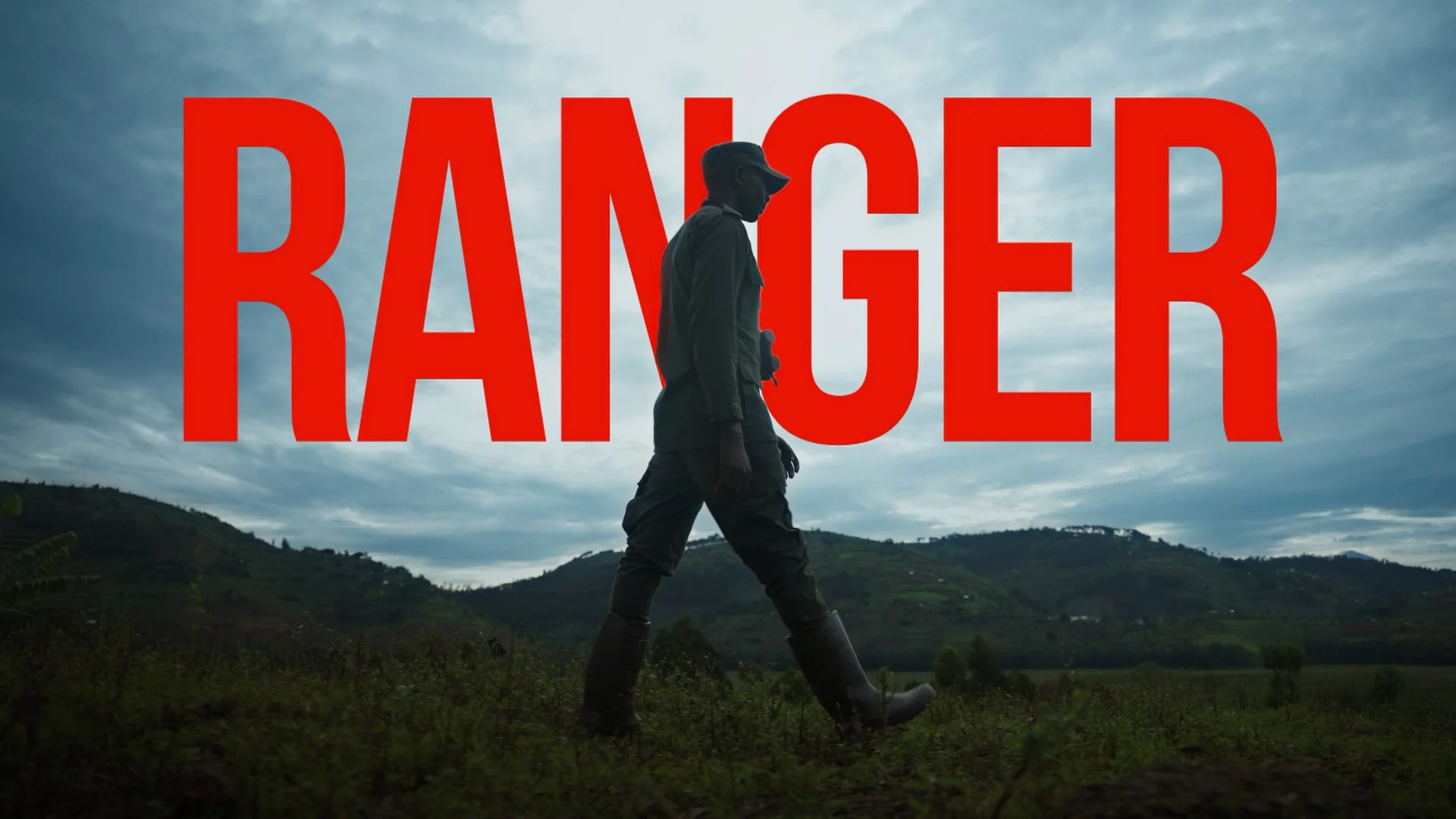 Silhouette of a man walking outdoors with hills and cloudy sky in the background, overlaid with the word 'RANGER' in large red letters.