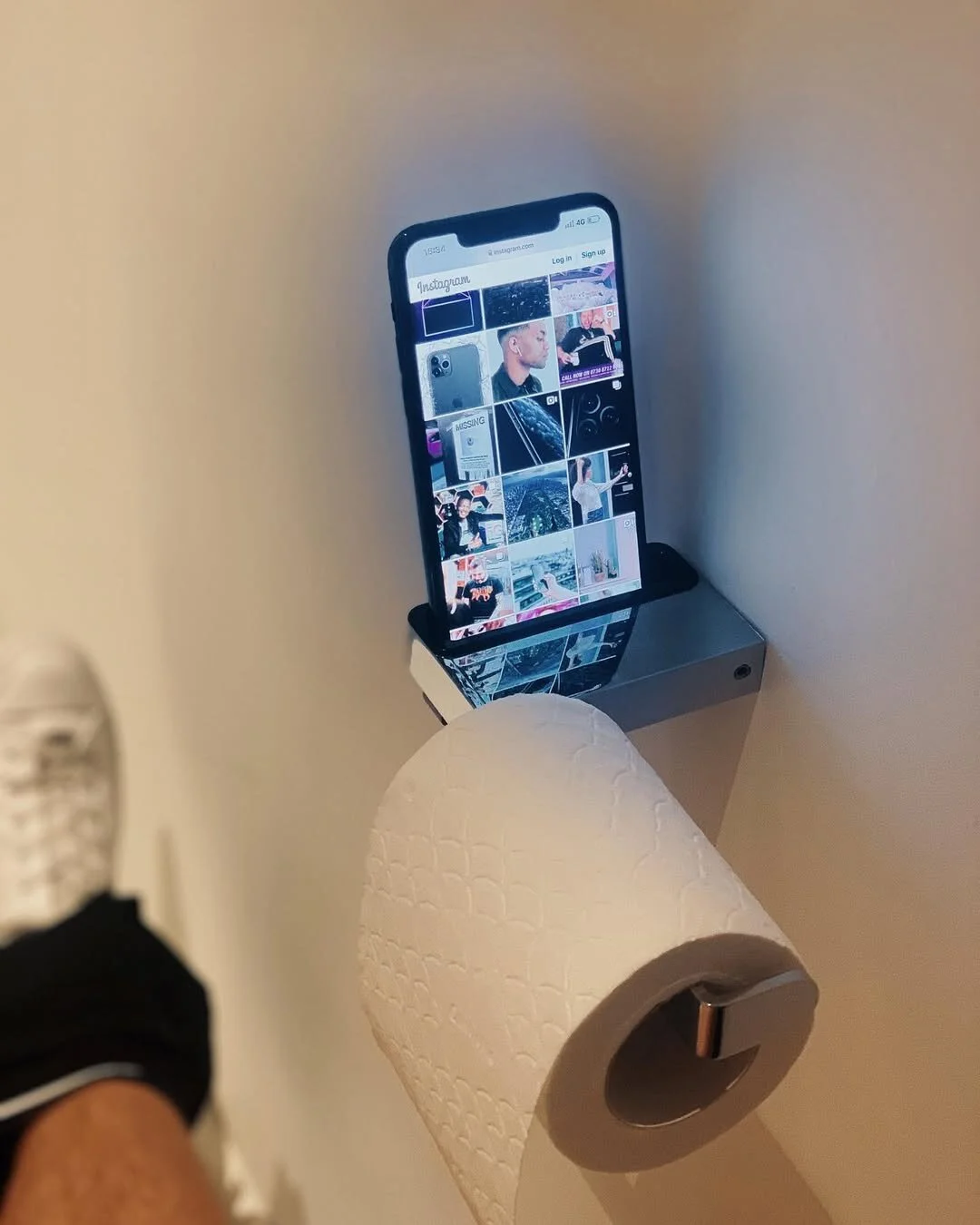 humanity is going to be ok. someone’s invented this. 📱+🚽 