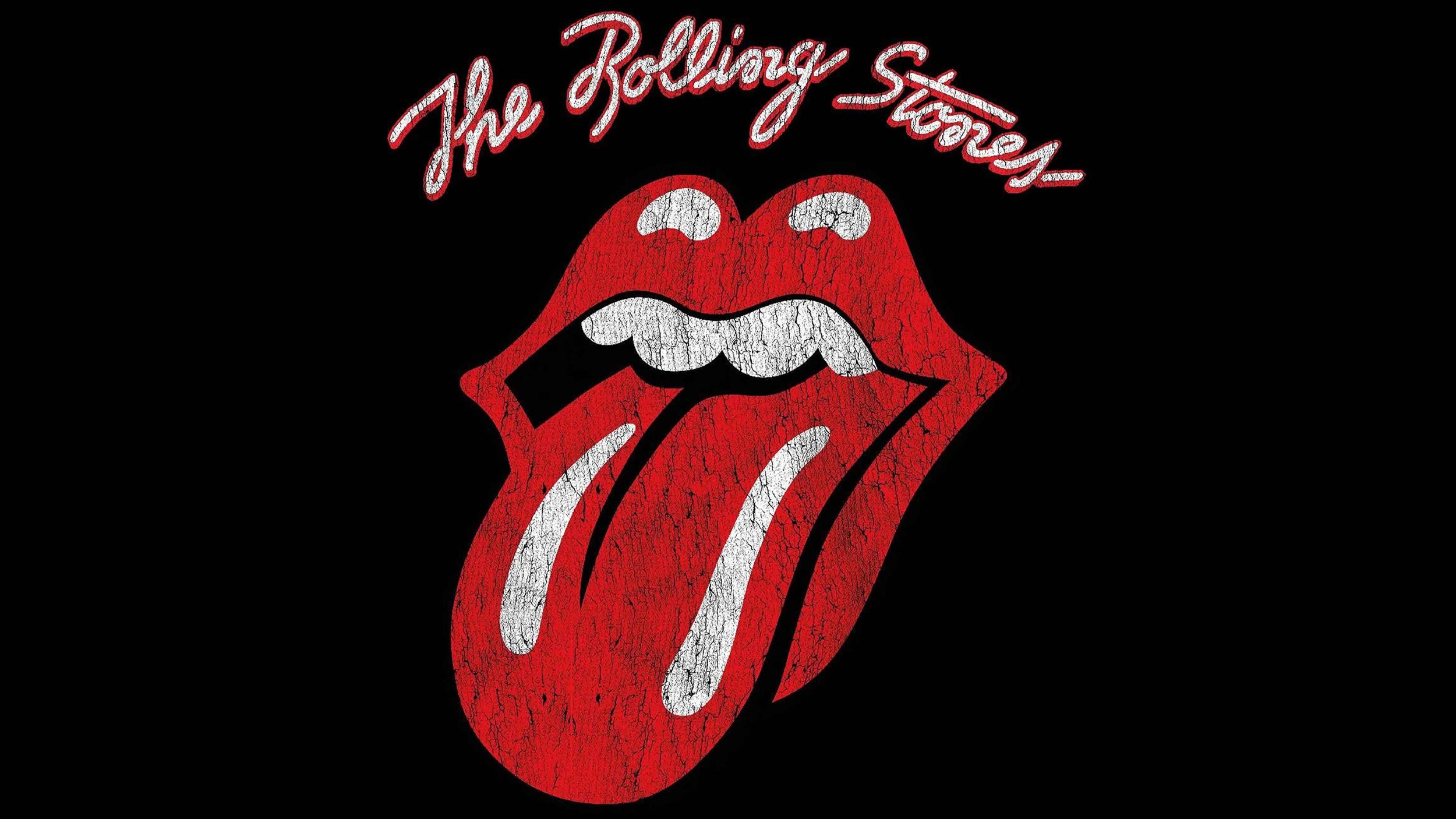 Illustration of red lips and tongue with "The Rolling Stones" above on a black background.