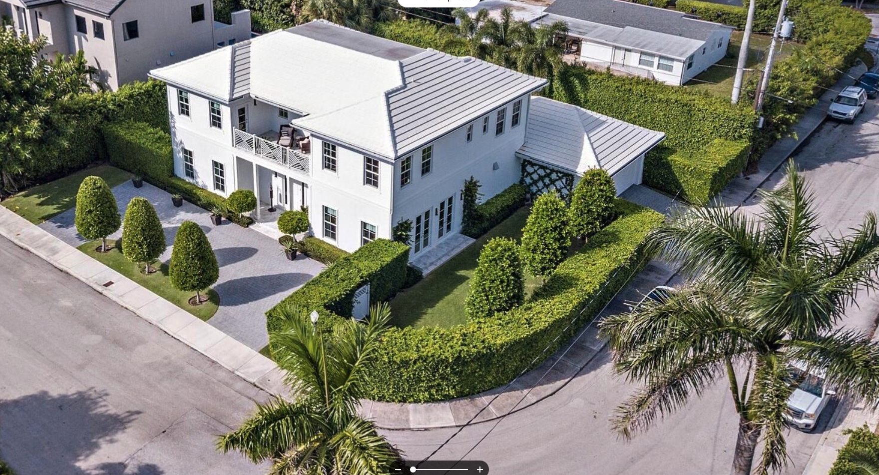 white-coastal-home-aerial-view-modern-landscaping-palm-beach-dune-ridge.png