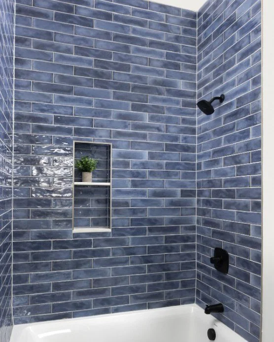 Cool, calm, and classic! 💙✨ This blue tile transforms the bathroom into a refreshing oasis.

 #interiordesign #mninteriordesign #karvonendesignstudio #InteriorDesign #details #mninteriordesigner #NewBuild #tiledesign #design #bathroomdesign #newcons