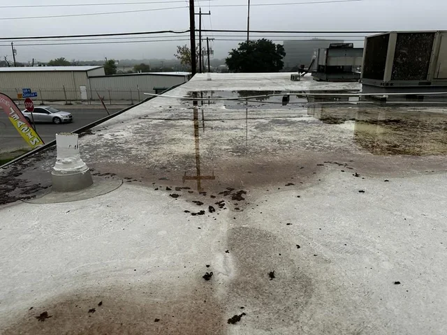 Is Your Commercial Roof a "Swimming Pool"? The Cost of Ponding Water