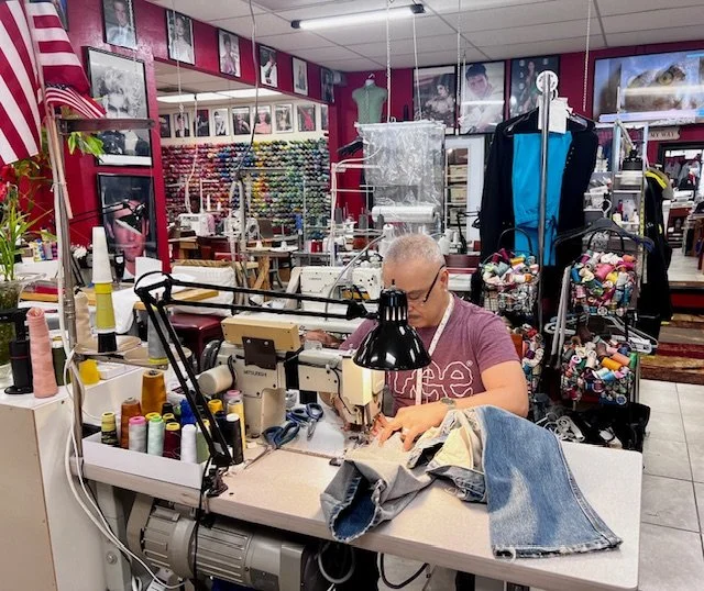 tailor performing shoulder alteration