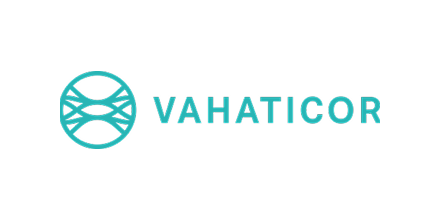 VAHATICOR logo with a stylized DNA strand icon in a circle next to the company name in blue