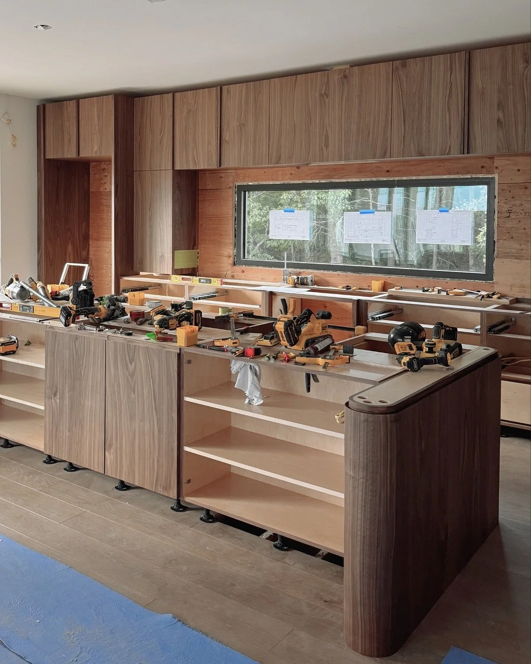 Kitchen progress at our mid-century modern Juniper Hill buildout 🛠️⁠ We built this project with custom veneer to keep the colour consistent and give it the look of solid wood, without the usual issues. In Muskoka&rsquo;s changing humidity, solid woo