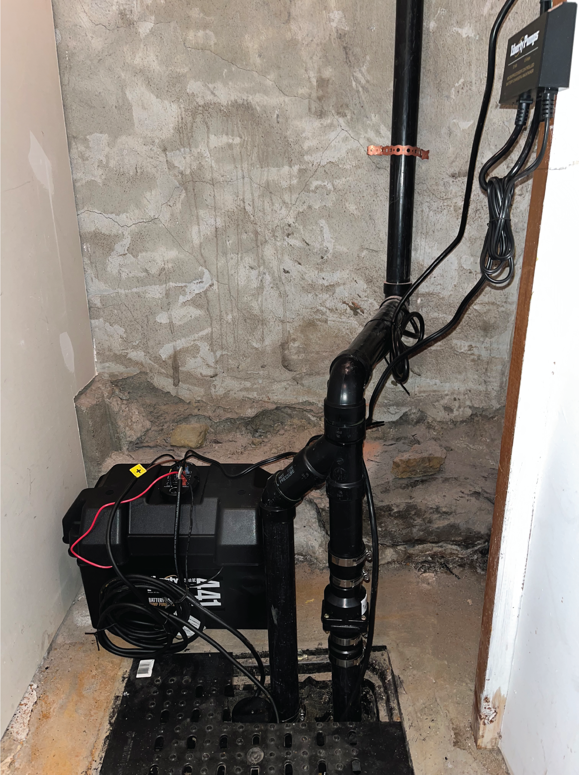 A sump pump and battery back up installation in a clients basement.