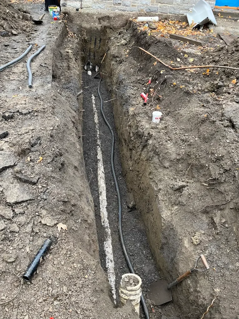 Excavation for new plumbing.