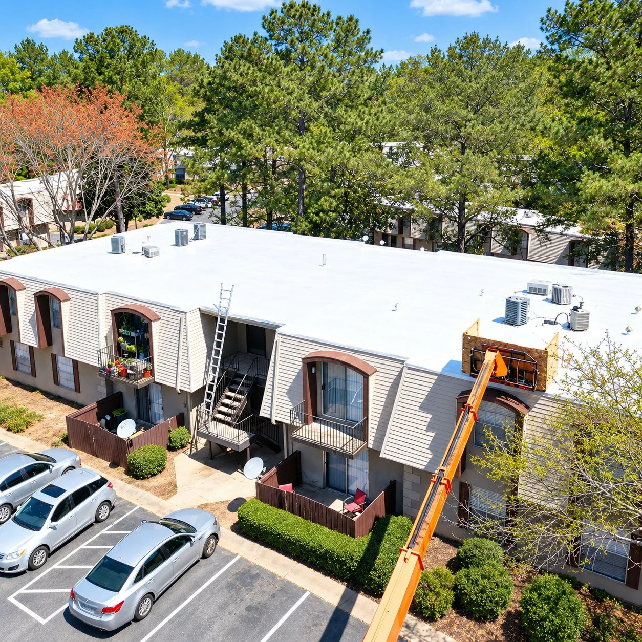 greenlight-roof-coating-apartment-complex-lift.jpg