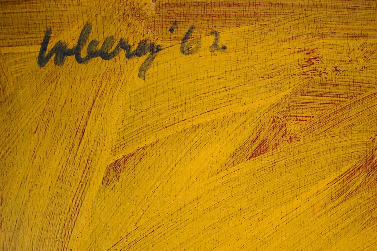 Close up of artist's signature on an abstract painting