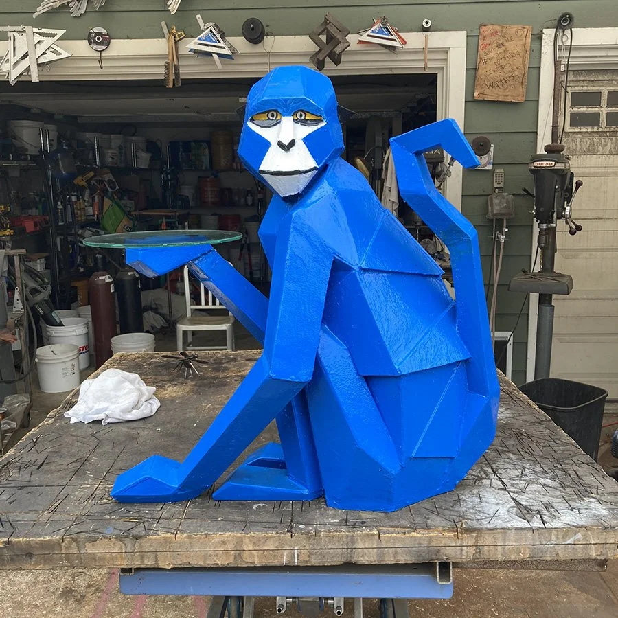 Blue Monkey sculpture by Dwight Hammack.