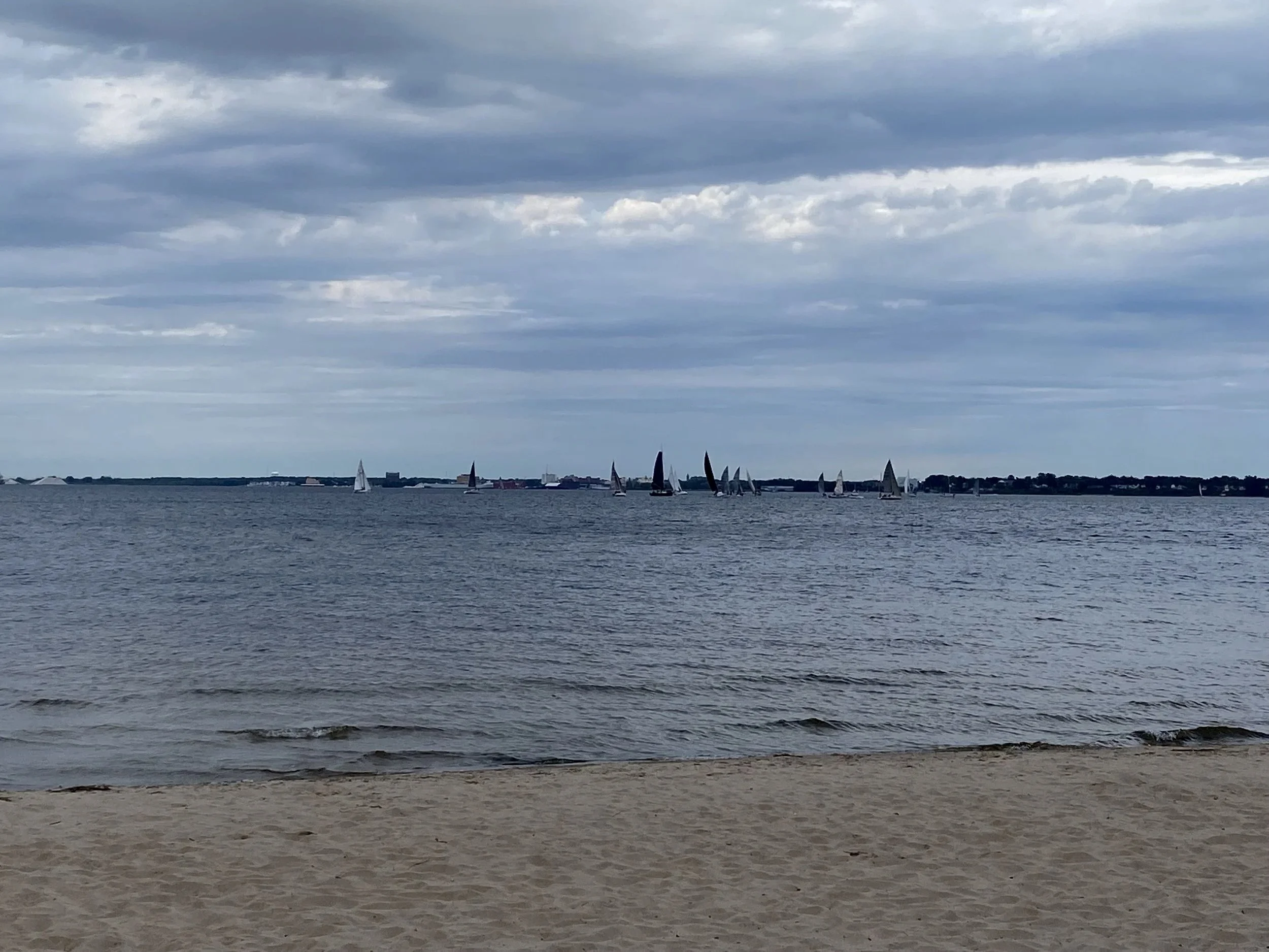 Sailboats on an overcast day representing loneliness and depression